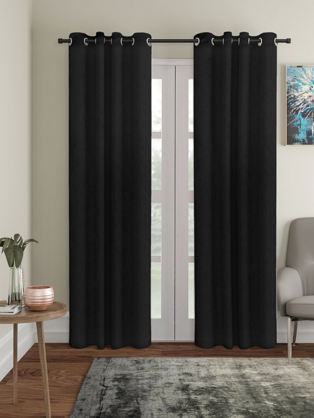

Myntra Elegant Homes Black 2 Pieces Room Darkening Satin Door Curtain