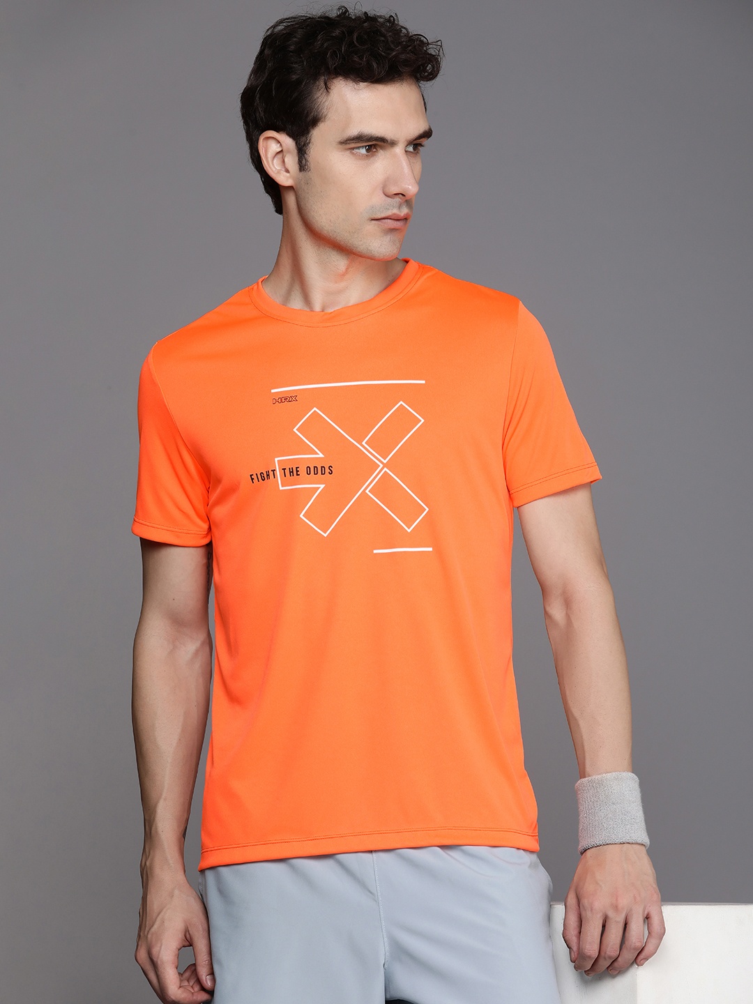 

HRX by Hrithik Roshan Brand Logo Printed Rapid-Dry Antimicrobial Training T-shirt, Orange