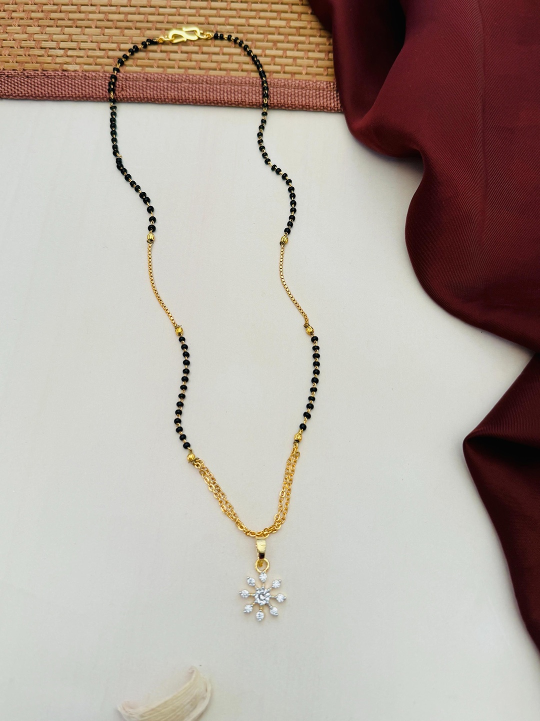 

Anouk Gold-Plated Artificial Stones and Beads Mangalsutra