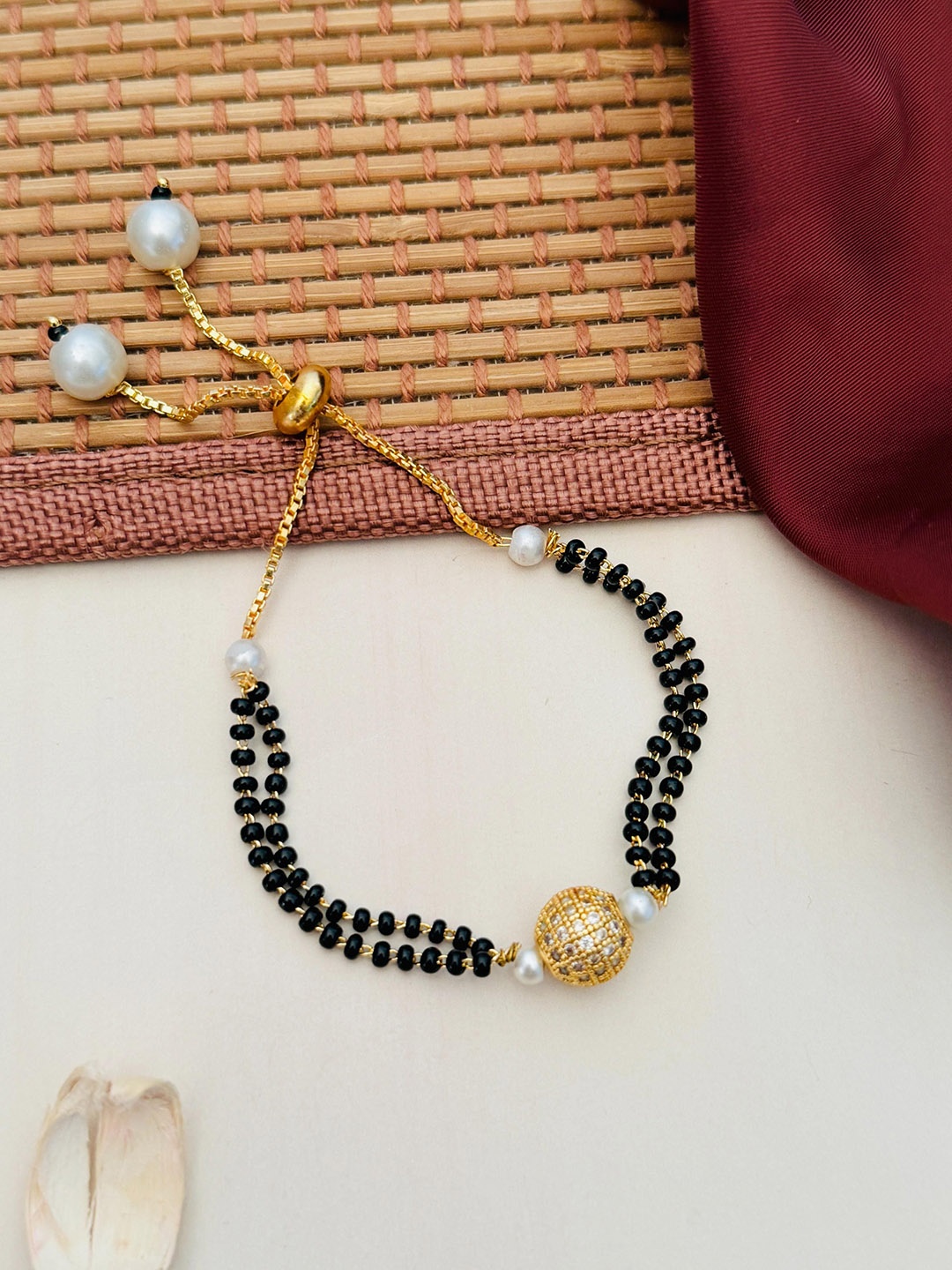 

Anouk Gold-Plated Artificial Stones and Beads Mangalsutra