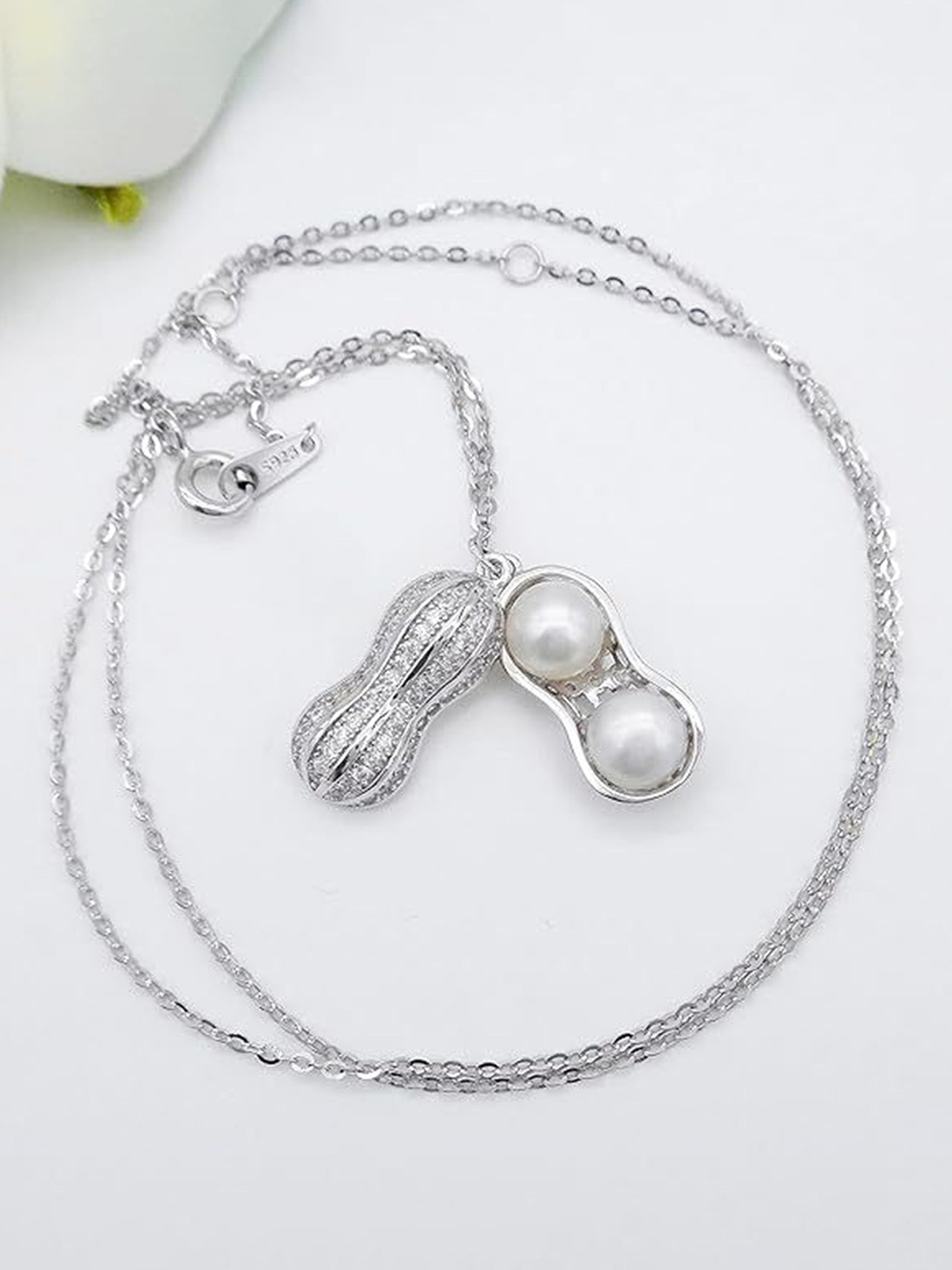 

DIVASTRI Silver Plated Anti Tarnish American Diamond Studded Pendant Necklace