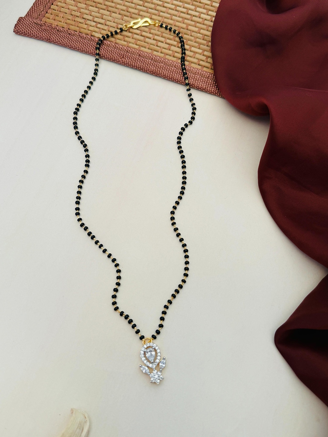 

Anouk Gold-Plated Artificial Stones and Beads Mangalsutra