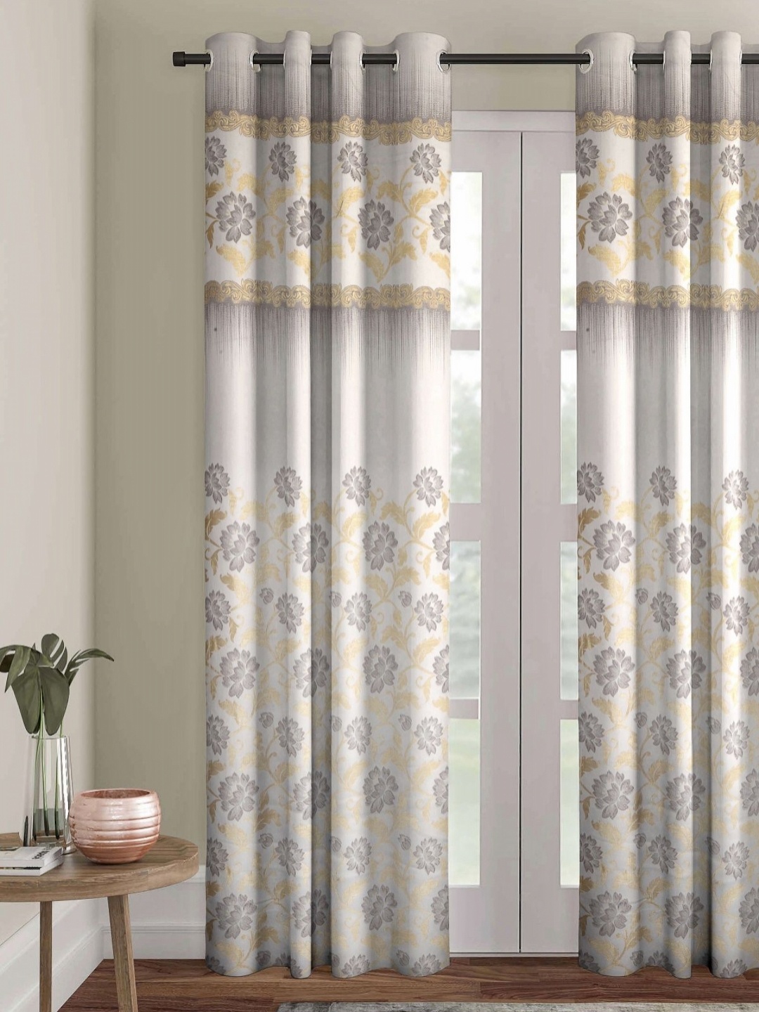 

Myntra Elegant Homes White & Grey Floral Room Darkening Jacquard Long Door Curtain