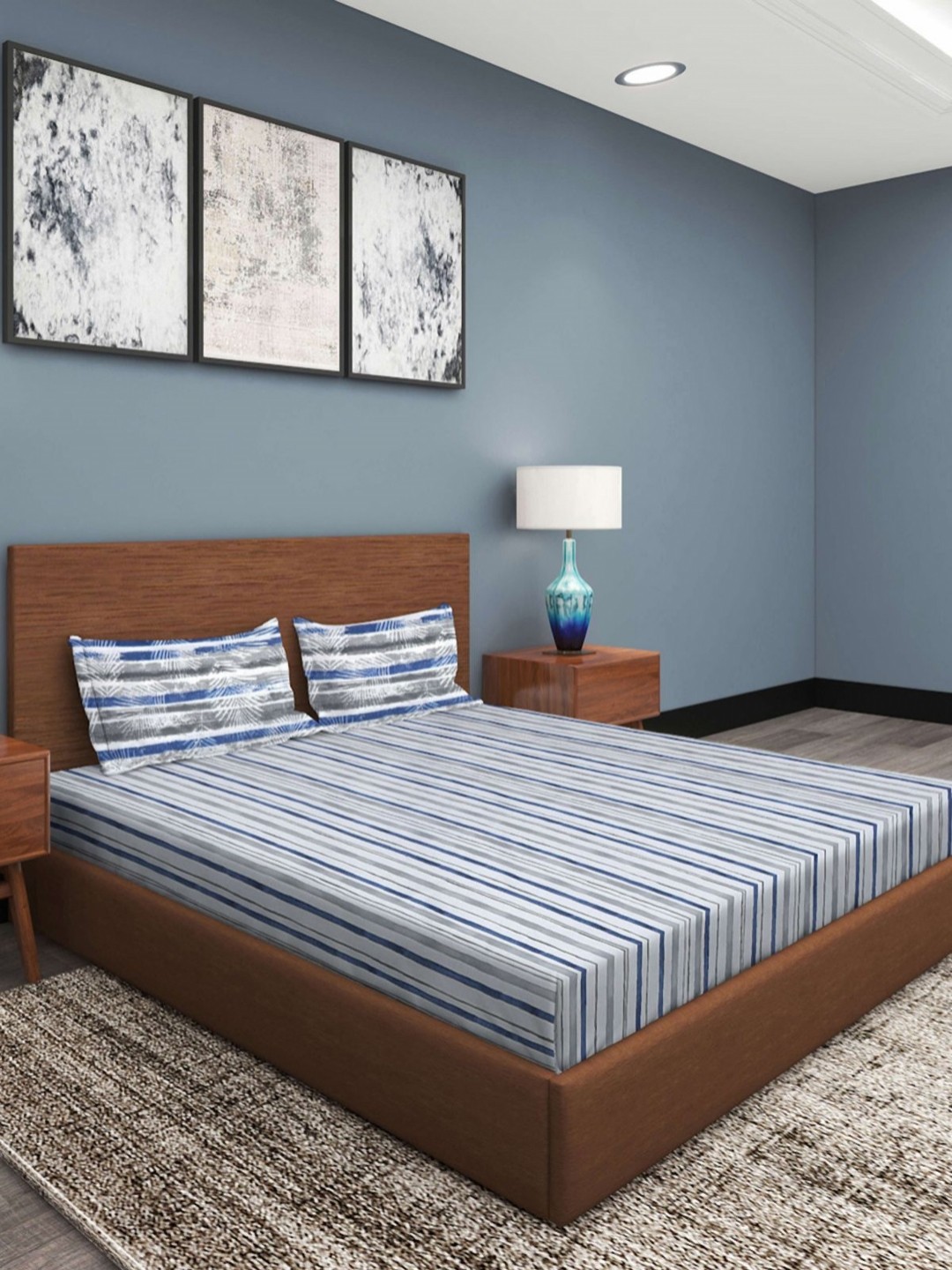 

Myntra Elegant Homes Blue & White Striped 210 TC Cotton King Bedsheet with 2 Pillow Covers