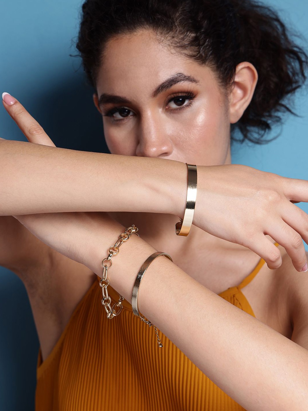 

DressBerry Women Brass Gold-Plated Wraparound Bracelet