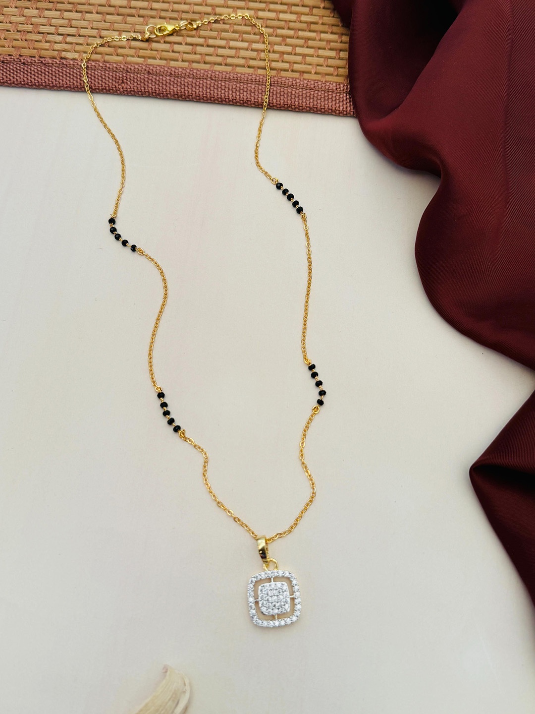 

Anouk Gold-Plated Artificial Stones and Beads Mangalsutra