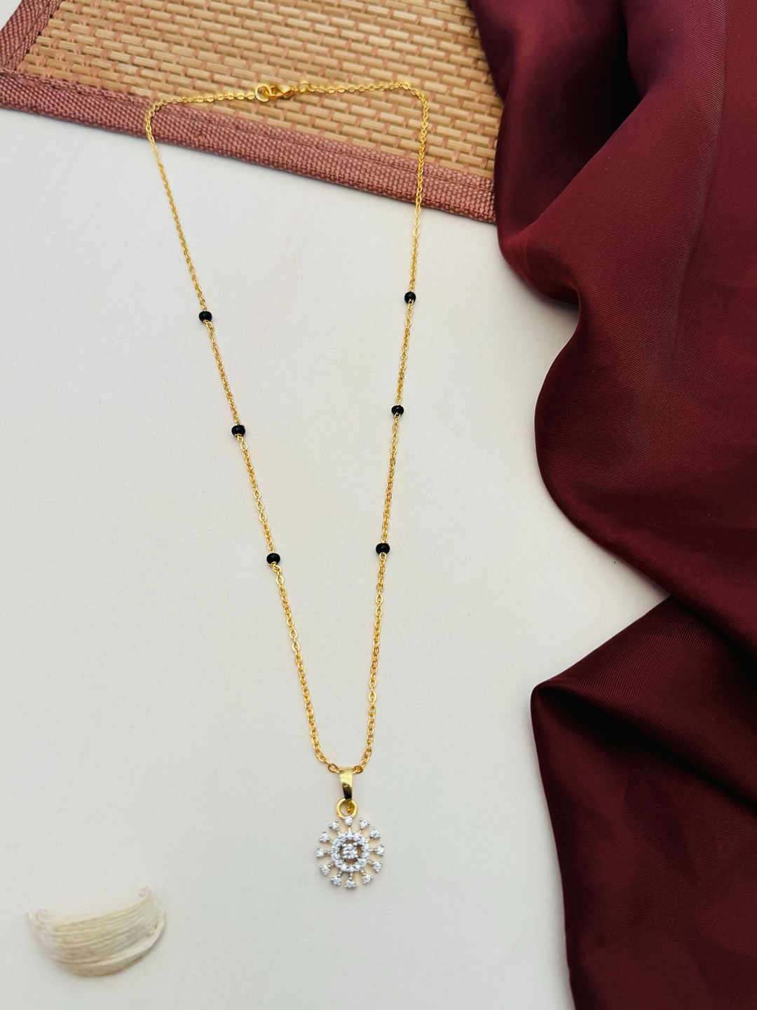 

Anouk Gold-Plated Artificial Stones and Beads Mangalsutra
