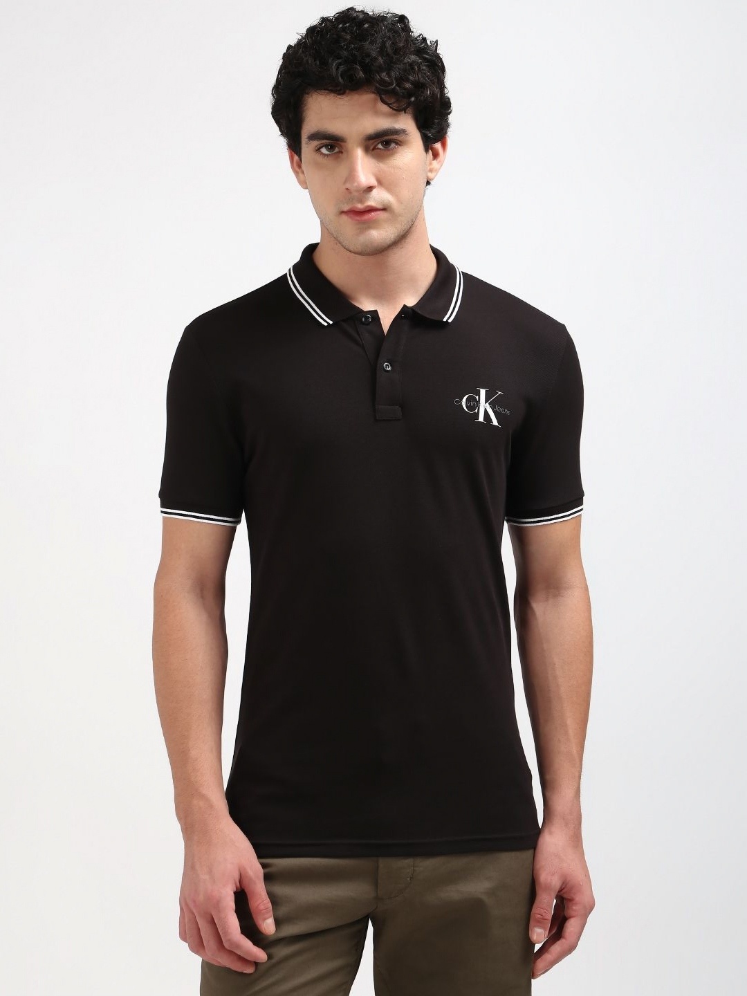 

Calvin Klein Jeans Men Striped Round Neck Cotton T-shirt, Black