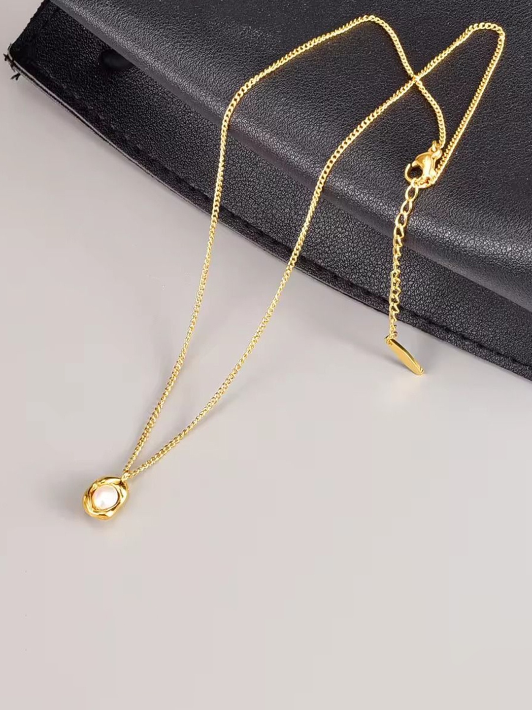 

DIVASTRI Gold Plated Anti Tarnish American Diamond Studded Pendant Necklace