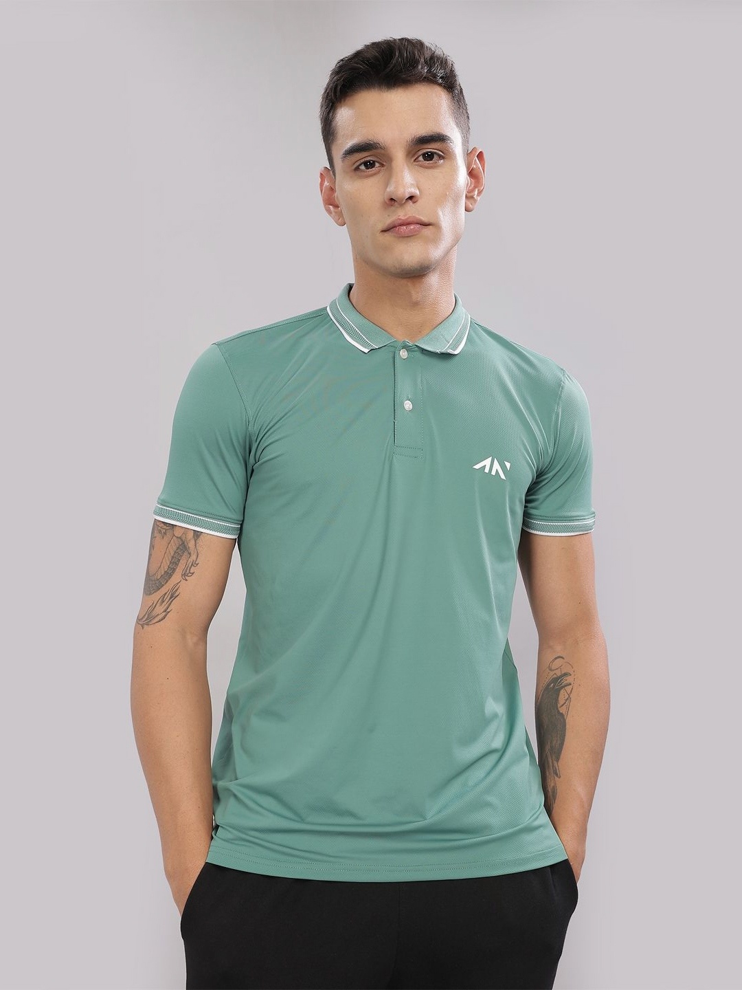 

AESTHETIC NATION Men Solid Polo Collar T-shirt, Sea green