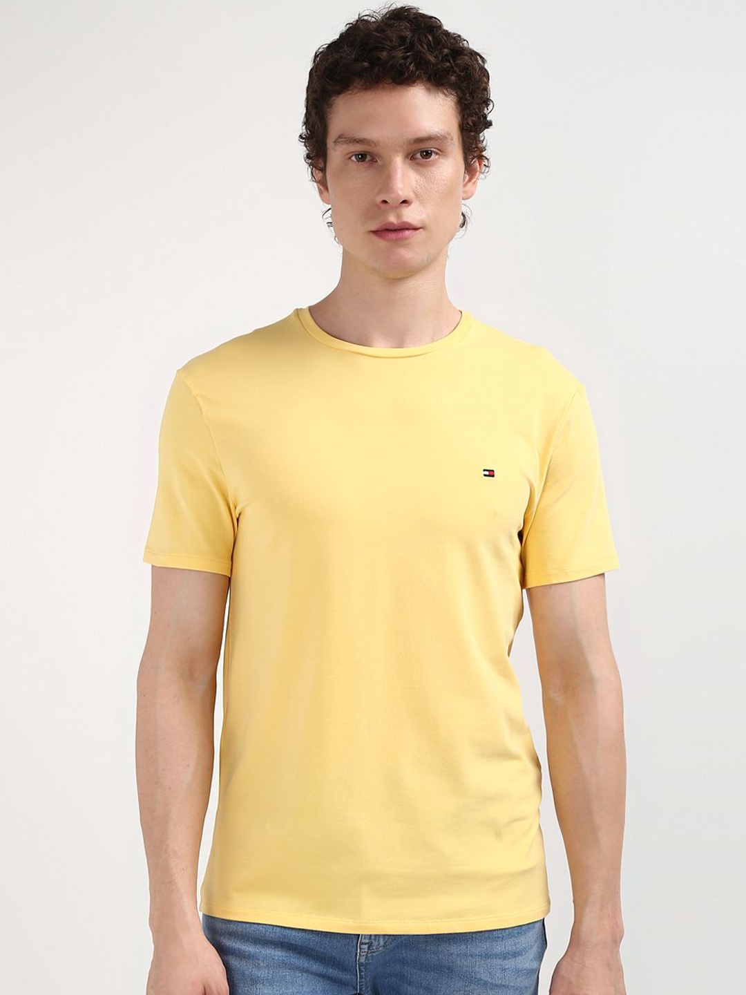 

Tommy Hilfiger Men Solid Round Neck T-shirt, Yellow