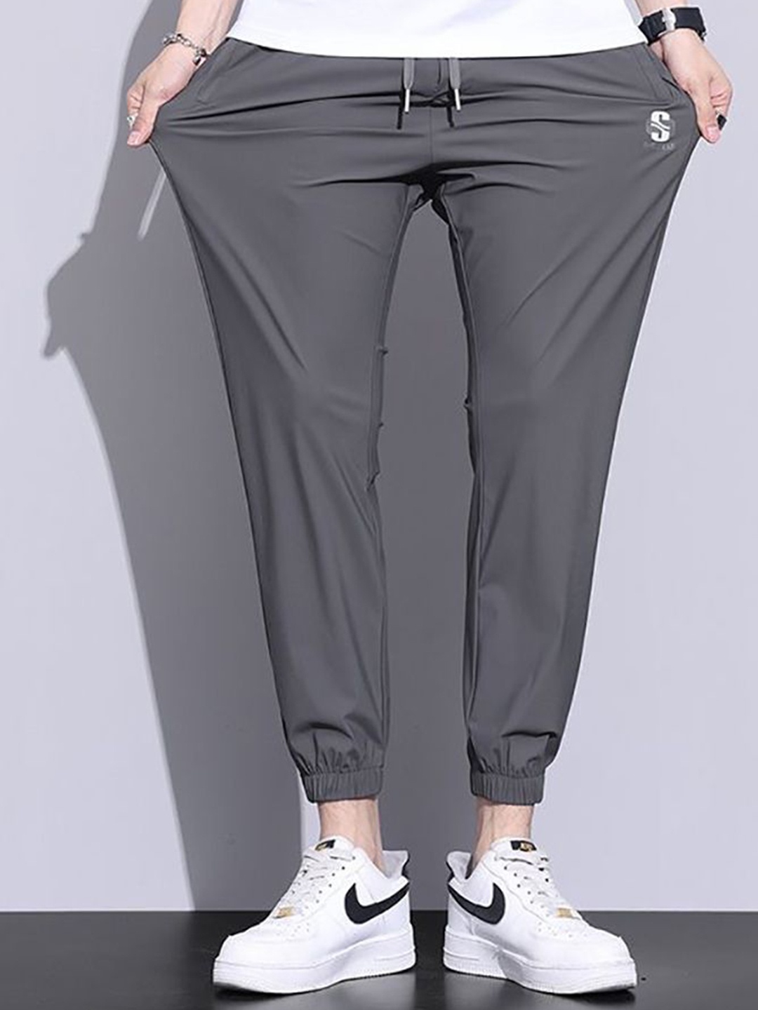 

StyleCast x Revolte Solid Men Chinos Trousers, Grey