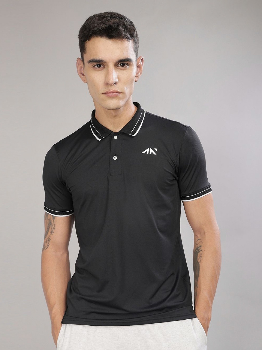 

AESTHETIC NATION Men Solid Polo Collar T-shirt, Black