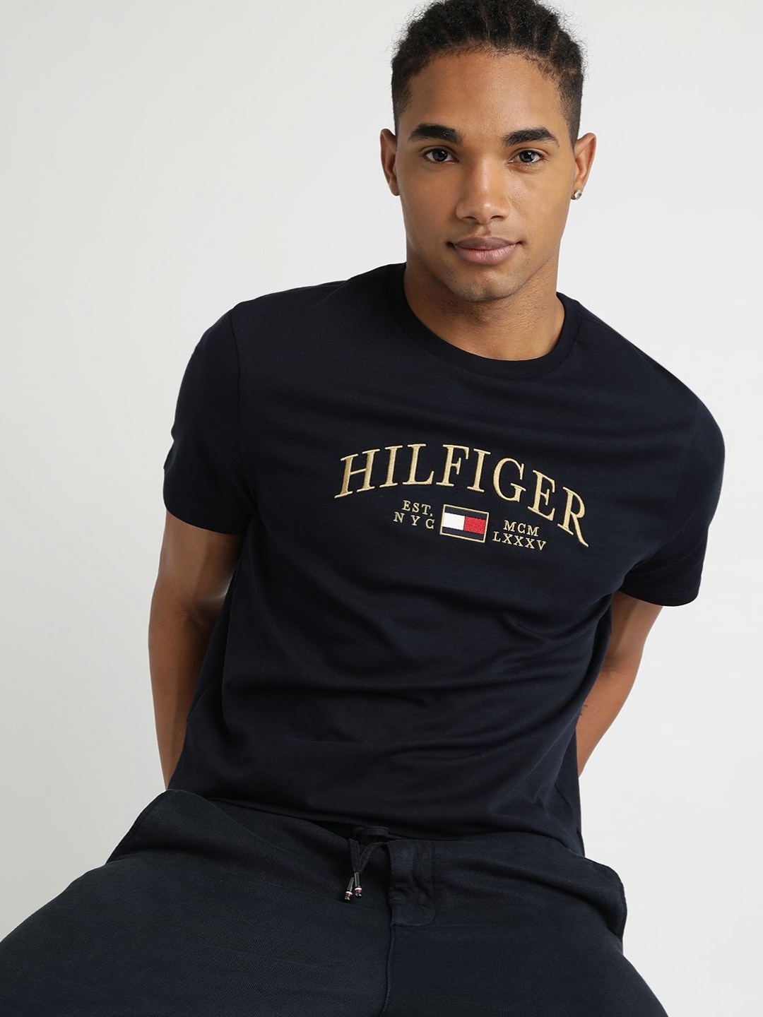 

Tommy Hilfiger Men Brand Logo Printed Round Neck Cotton T-shirt, Black