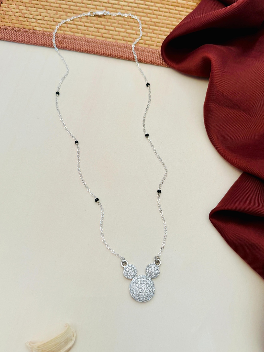 

Anouk Silver-Plated Artificial Stones and Beads Mangalsutra