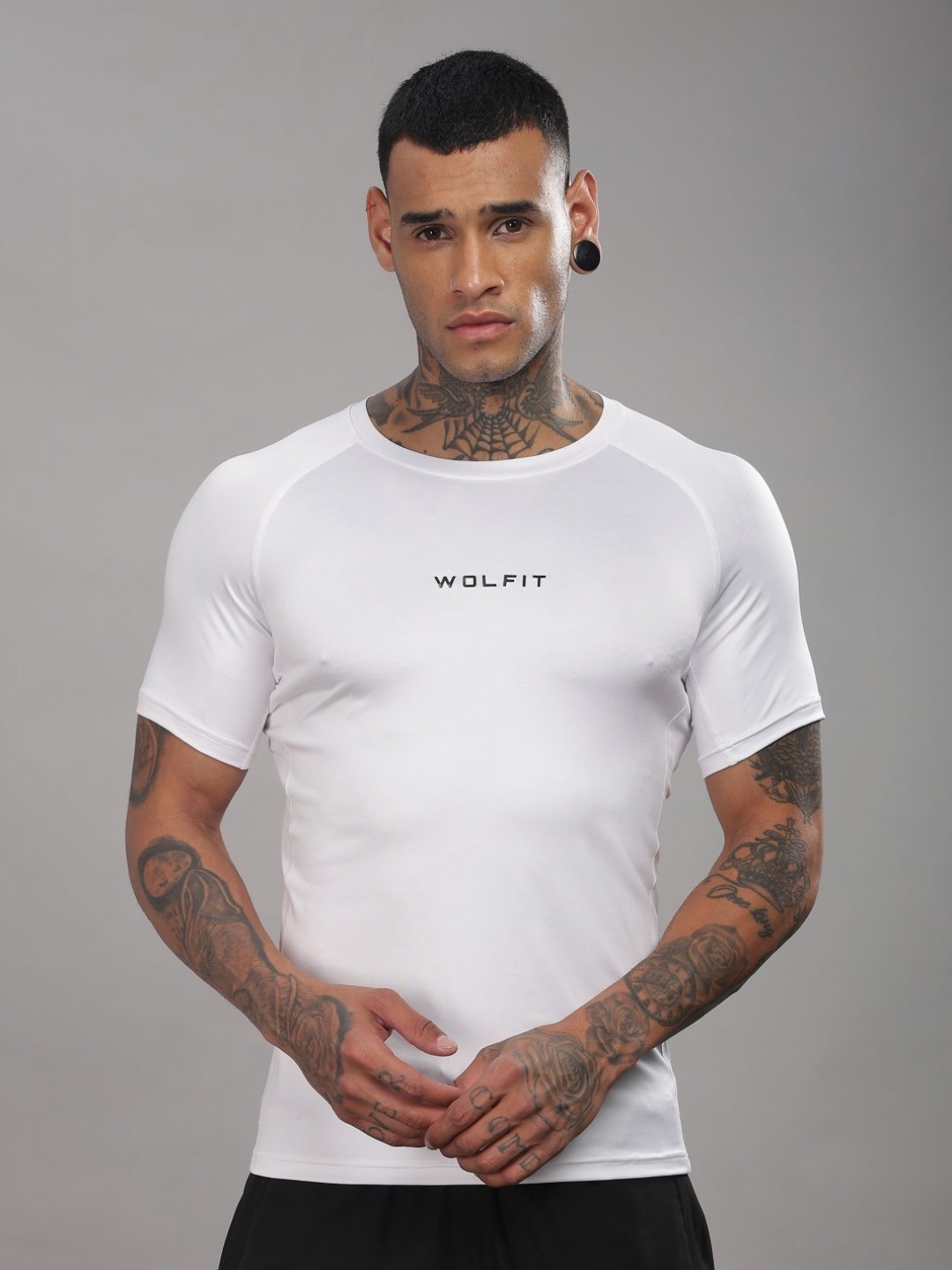 

WOLFIT ATHLEISURE Men Dri-FIT Solid Round Neck Compression T-shirt, White