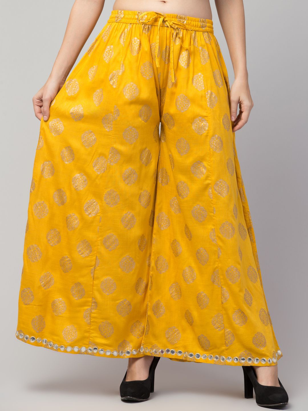 

FAMBEE Women Ethnic Motifs Printed Flared Knitted Palazzos, Mustard