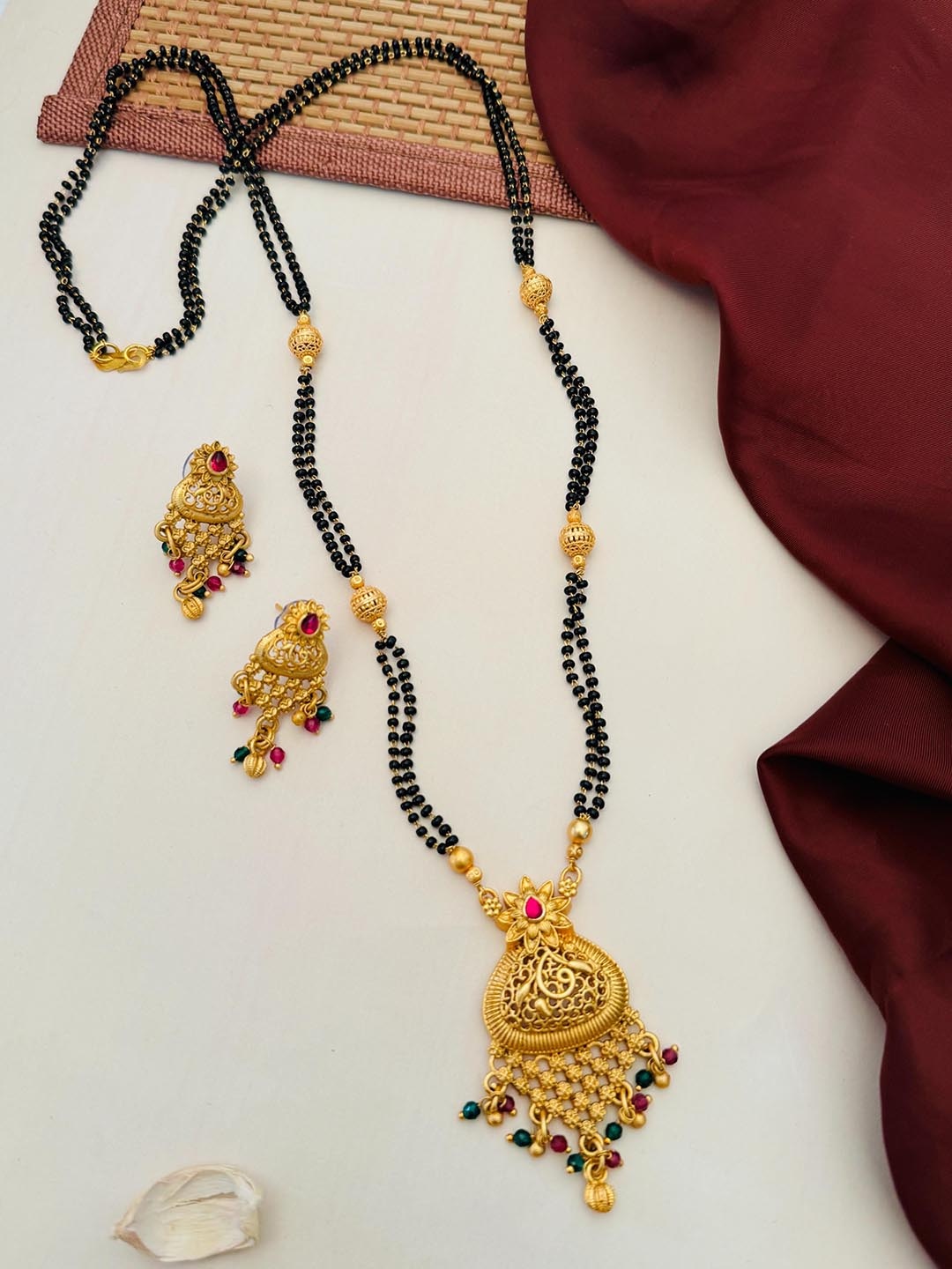 

Anouk Gold-Plated Artificial Stones and Beads Mangalsutra