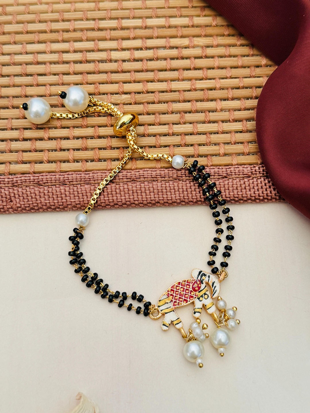 

Anouk Gold-Plated Artificial Stones and Beads Mangalsutra