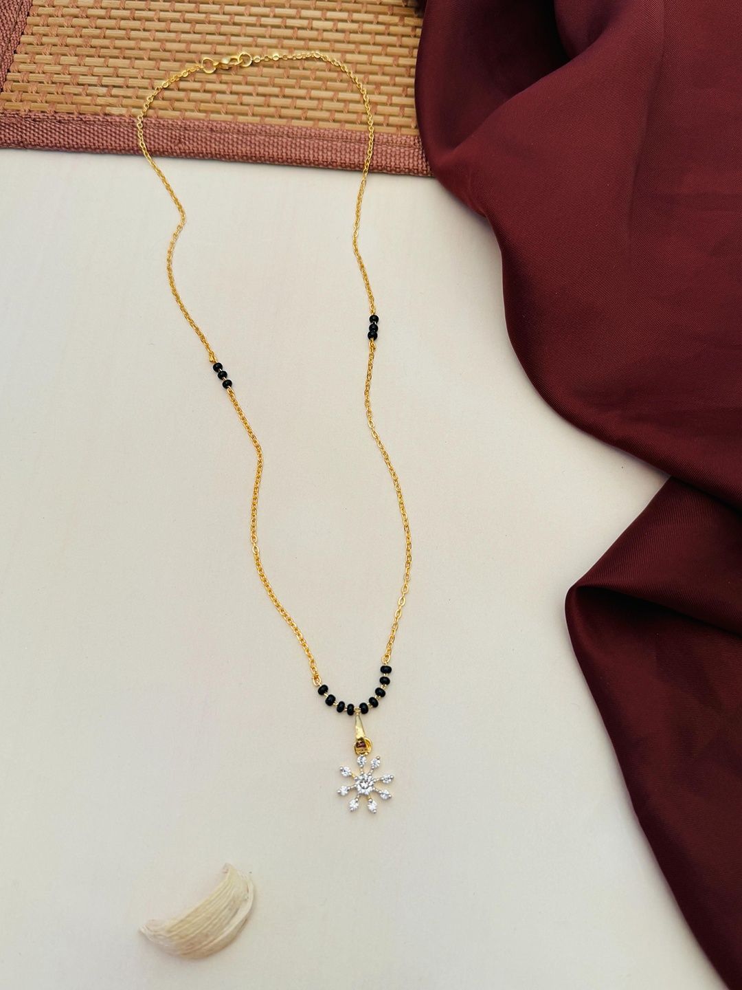 

Anouk Gold-Plated Artificial Stones and Beads Mangalsutra