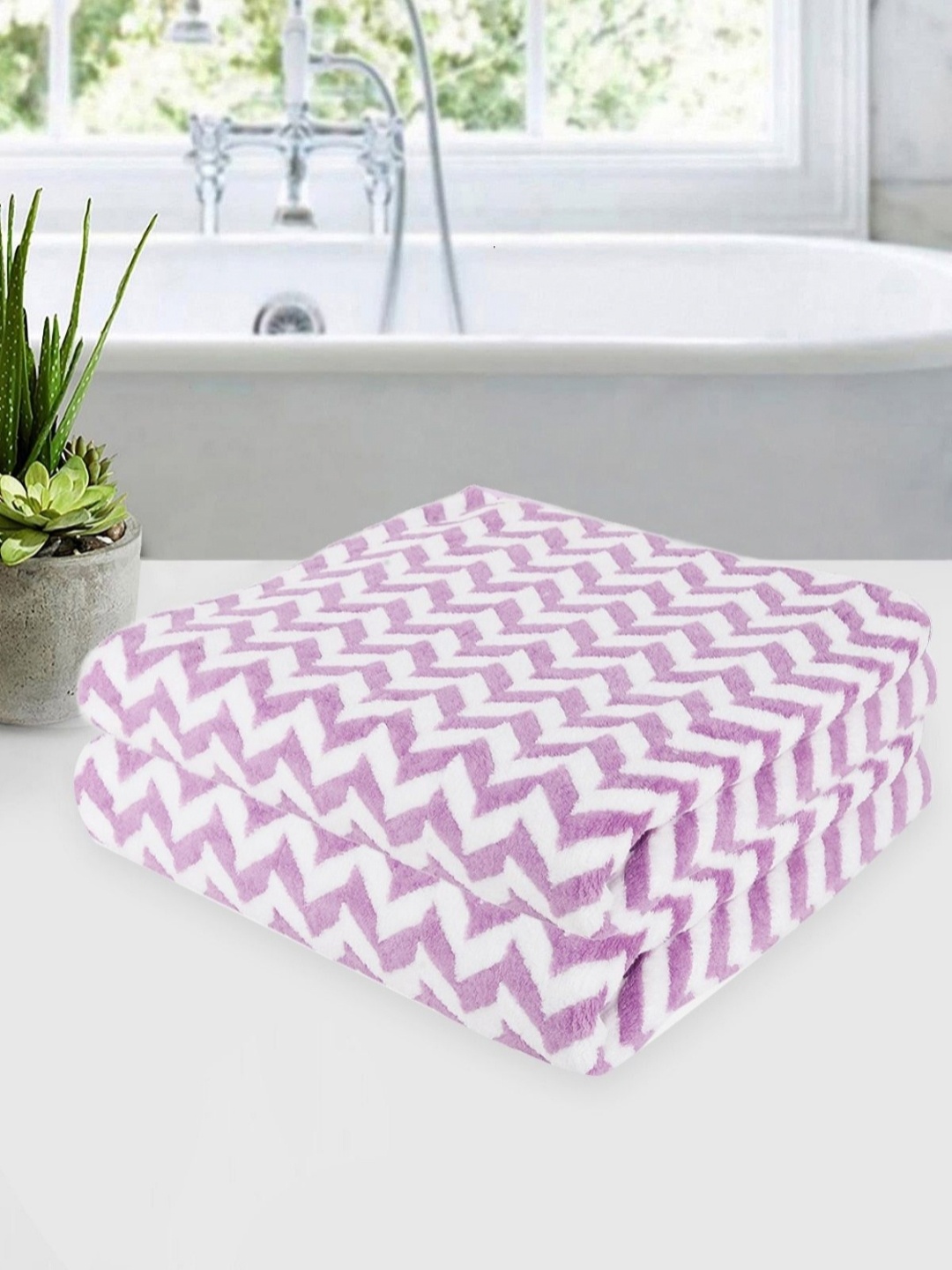 

Myntra Elegant Homes White & Lavender Printed Microfiber 350 GSM Bath Towel