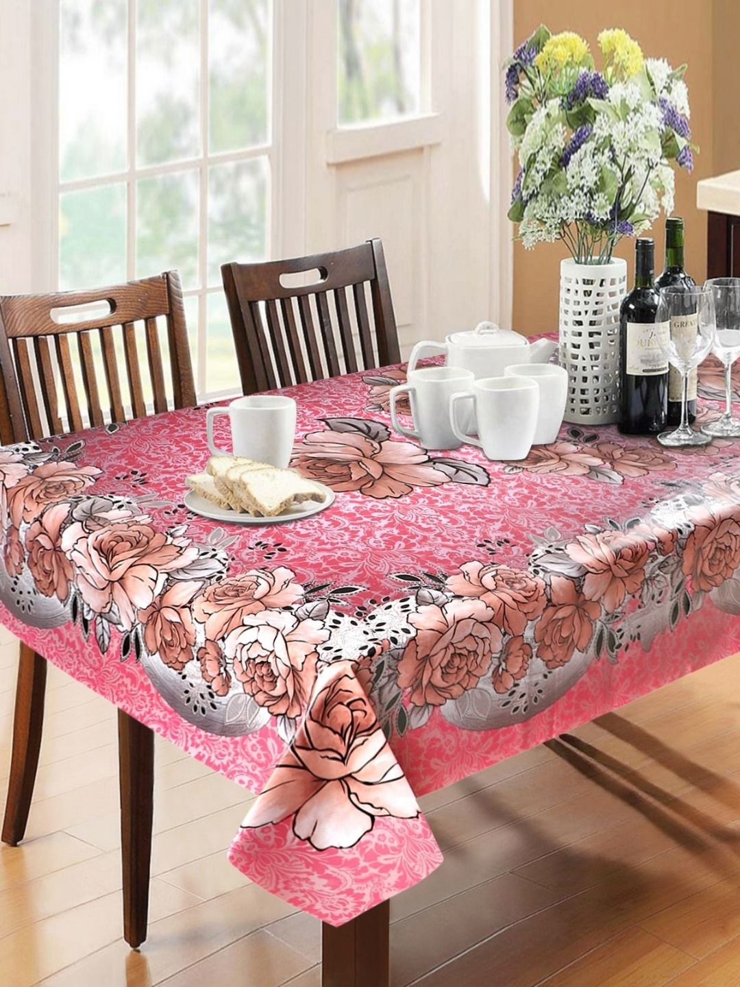 

Dakshya Industries Pink Floral Waterproof 6-Seater Table Cover