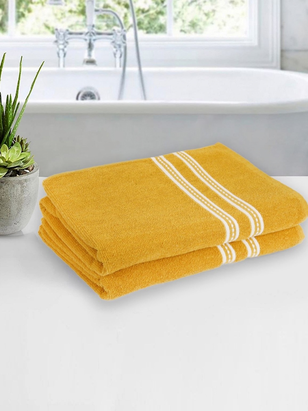 

Myntra Elegant Homes Yellow & White 2 Pieces Cotton 500 GSM Bath Towels