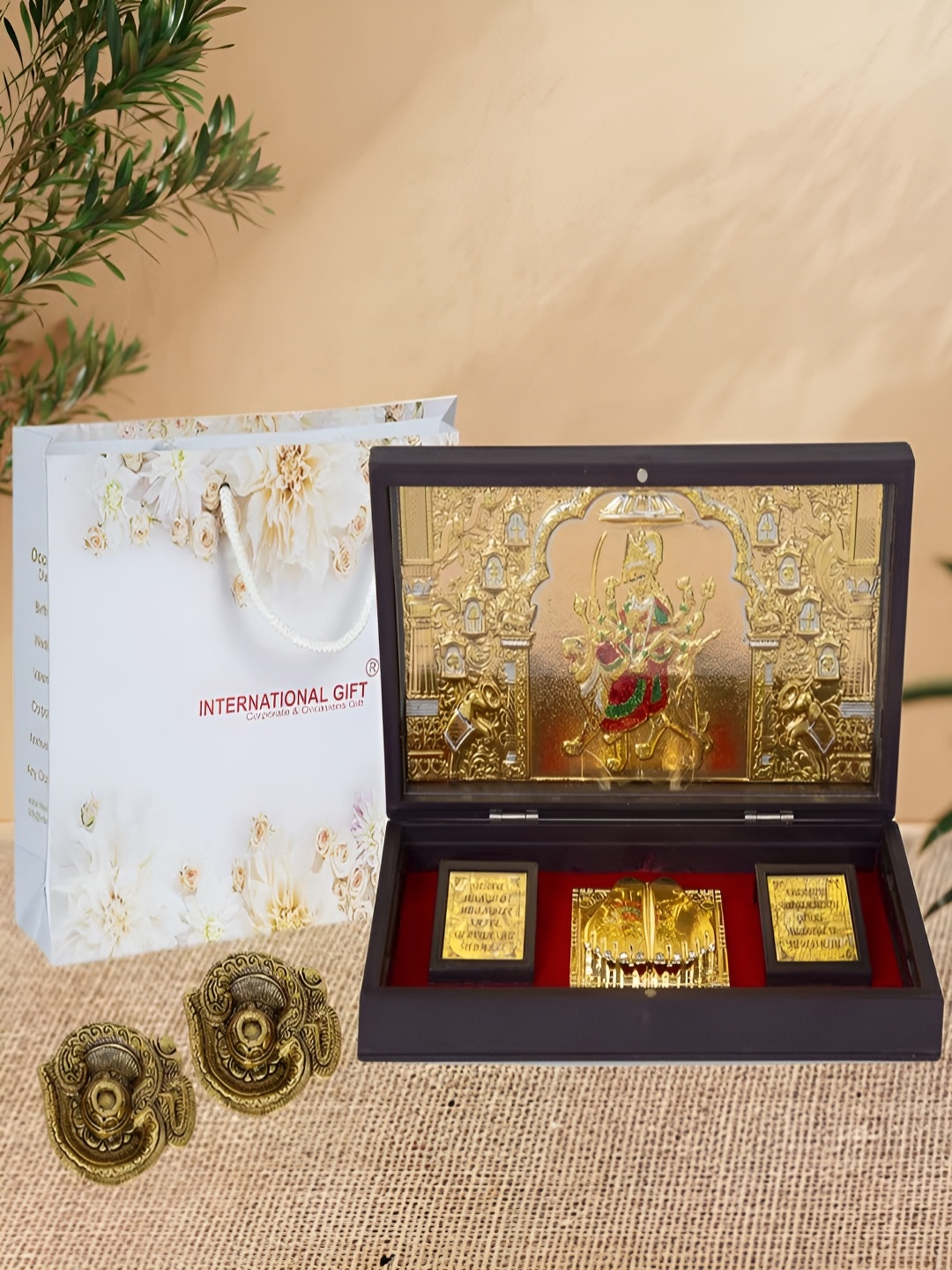 

INTERNATIONAL GIFT Gold-Toned Durga Mata Charan Paduka Box With Diya