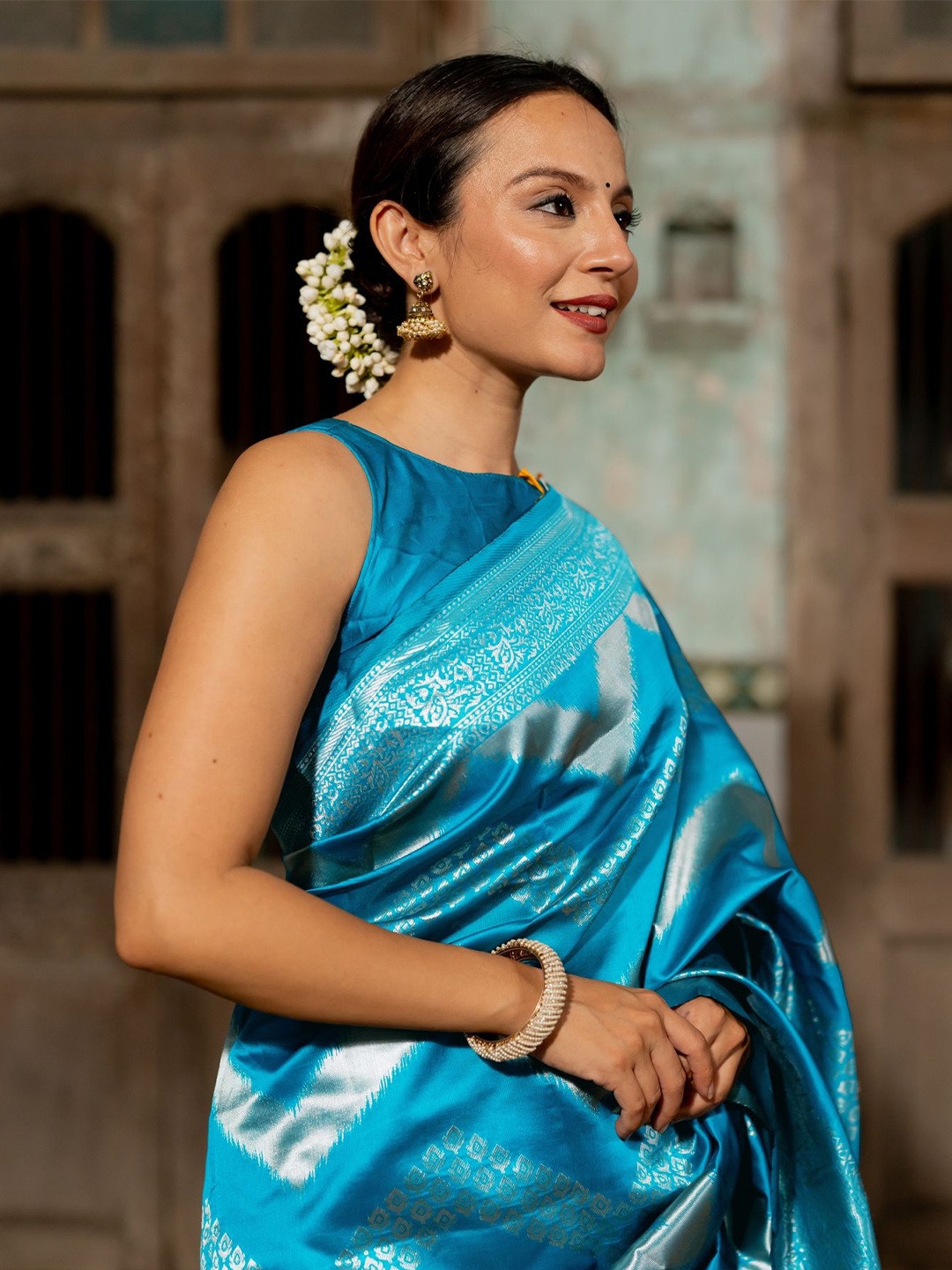 

Subham Woven Design Zari Silk Blend Banarasi Saree, Turquoise blue