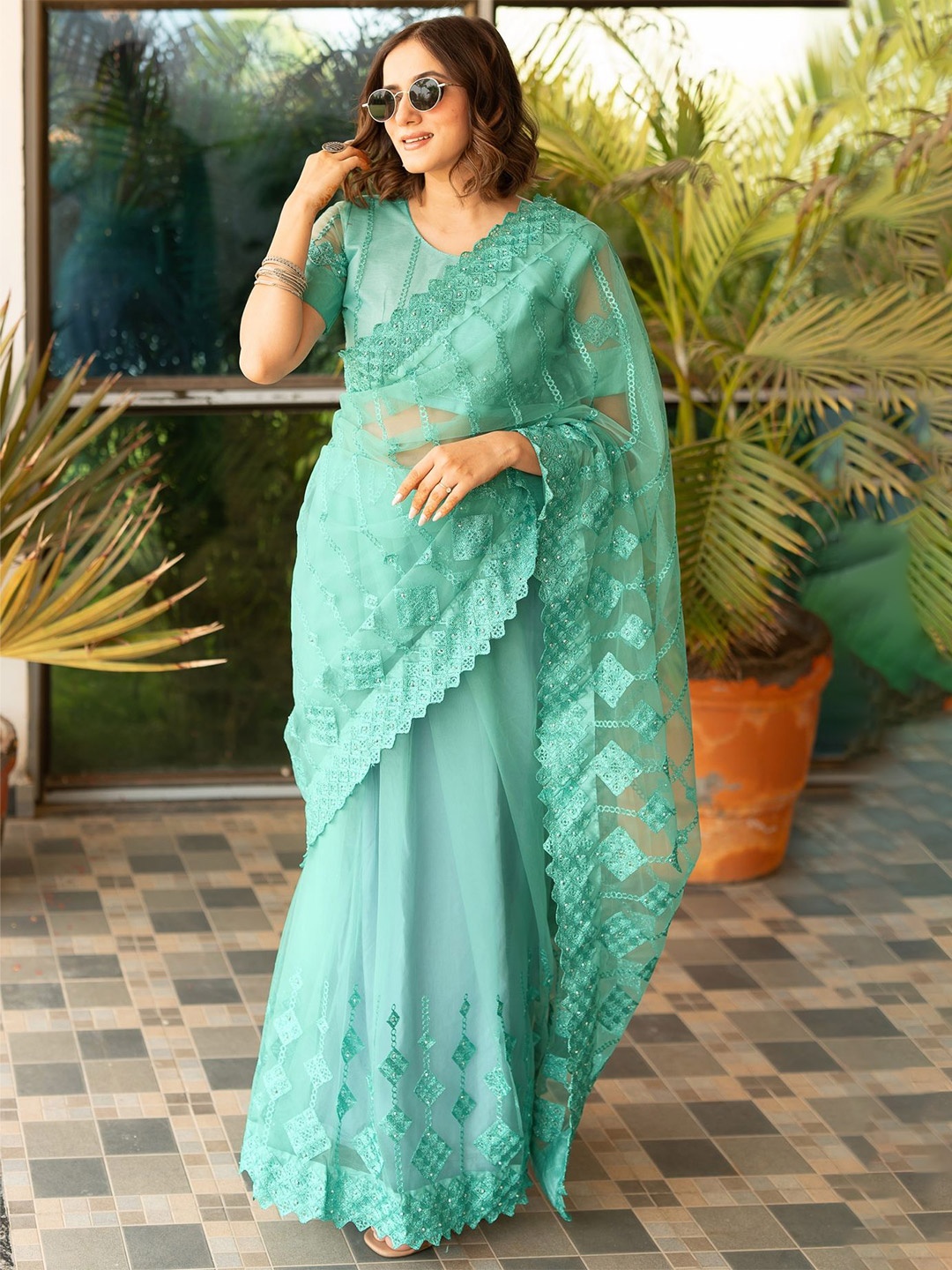 

Subham Embellished Embroidered Net Saree, Teal