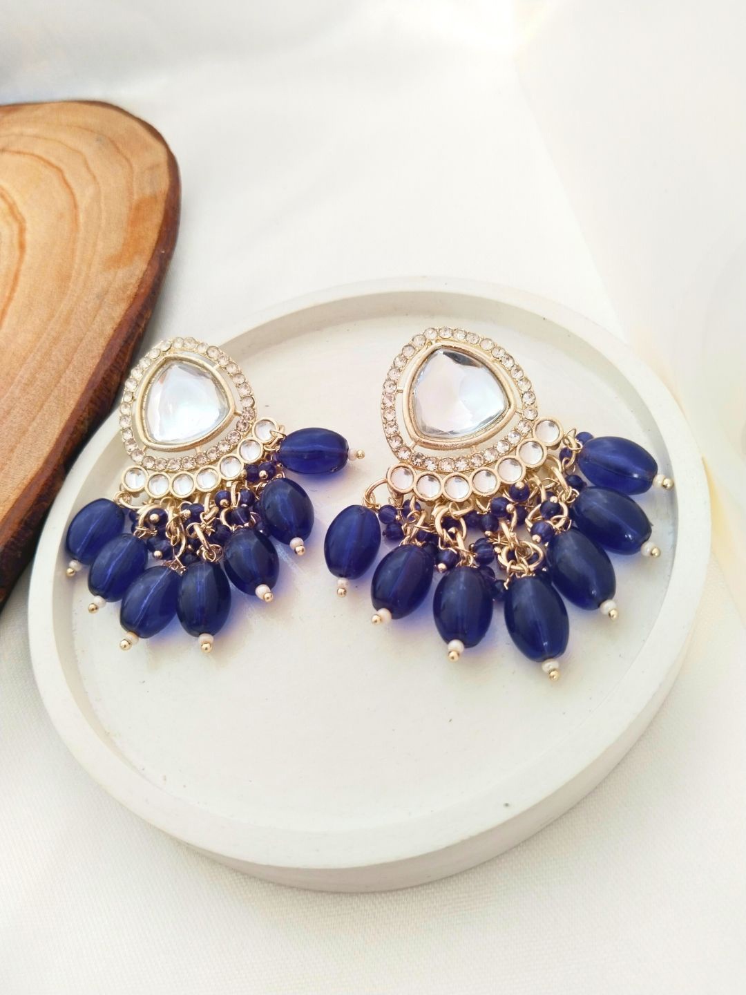 

Anouk Navy Blue Gold-Plated Teardrop Shaped Kundan Studded Drop Earrings