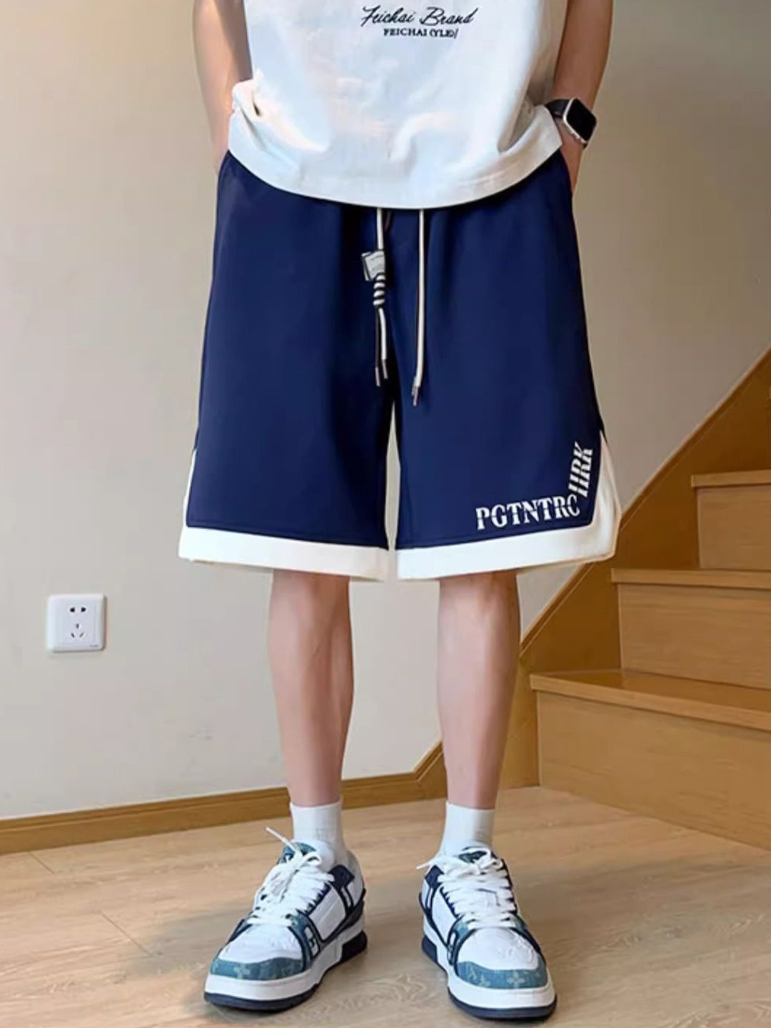 

StyleCast x Revolte Men Typography Shorts, Navy blue