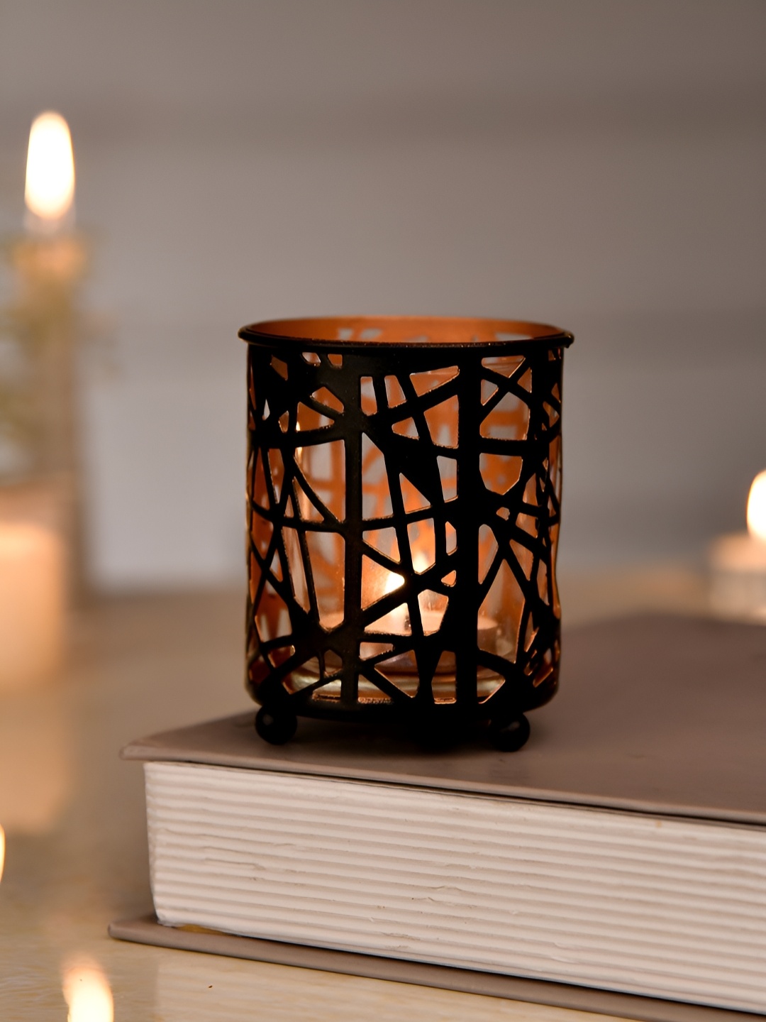 

TAYHAA Black & Copper Toned Textured Metal Candle Holder