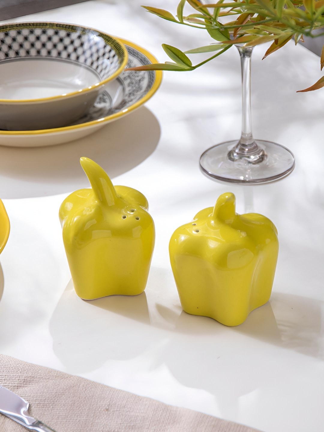 

The Decor Mantra Yellow 2 Pieces Ceramic Salt and Pepper Shakers