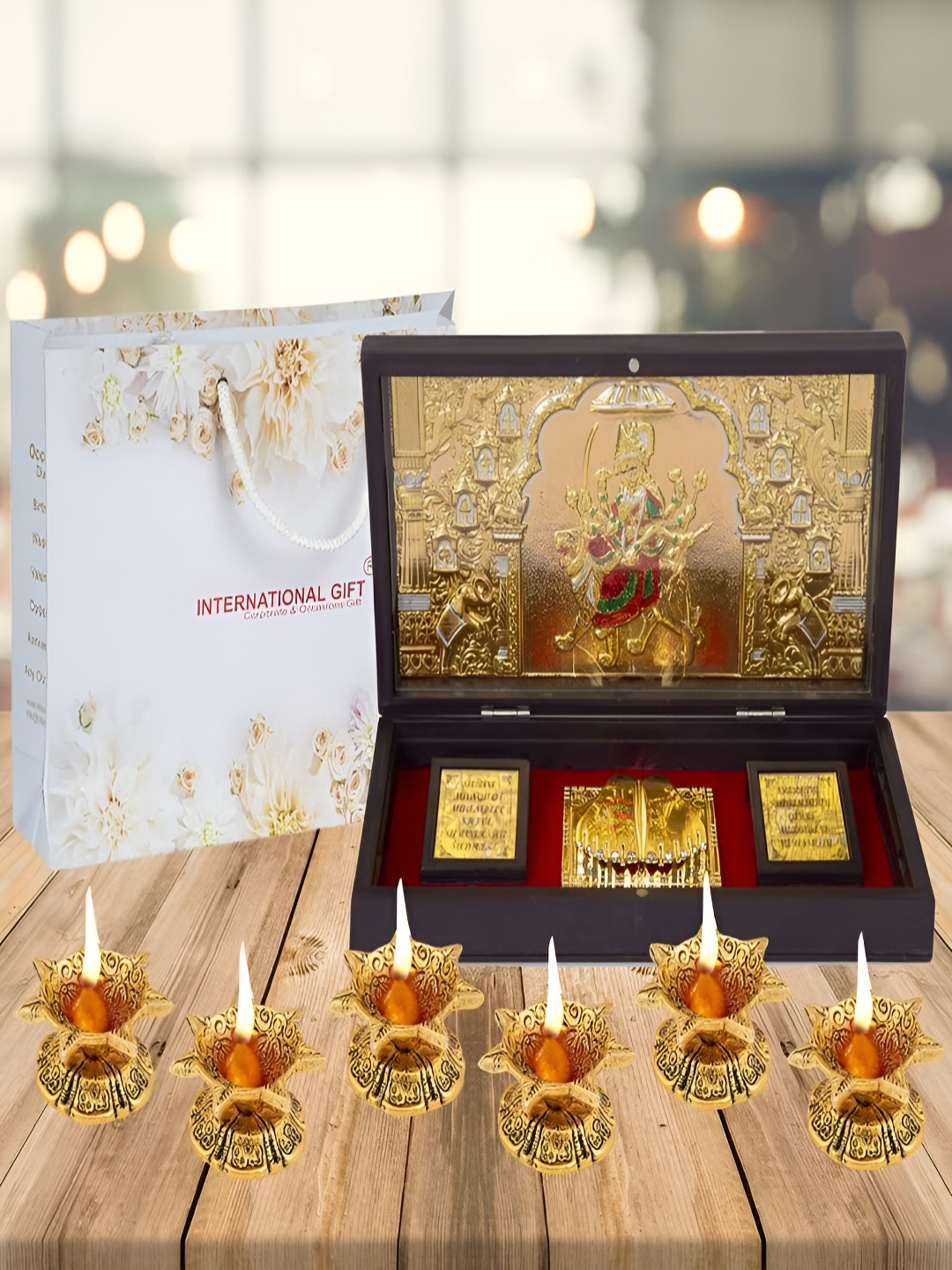 

INTERNATIONAL GIFT Gold-Toned Durga Mata Charan Paduka Box with Diya