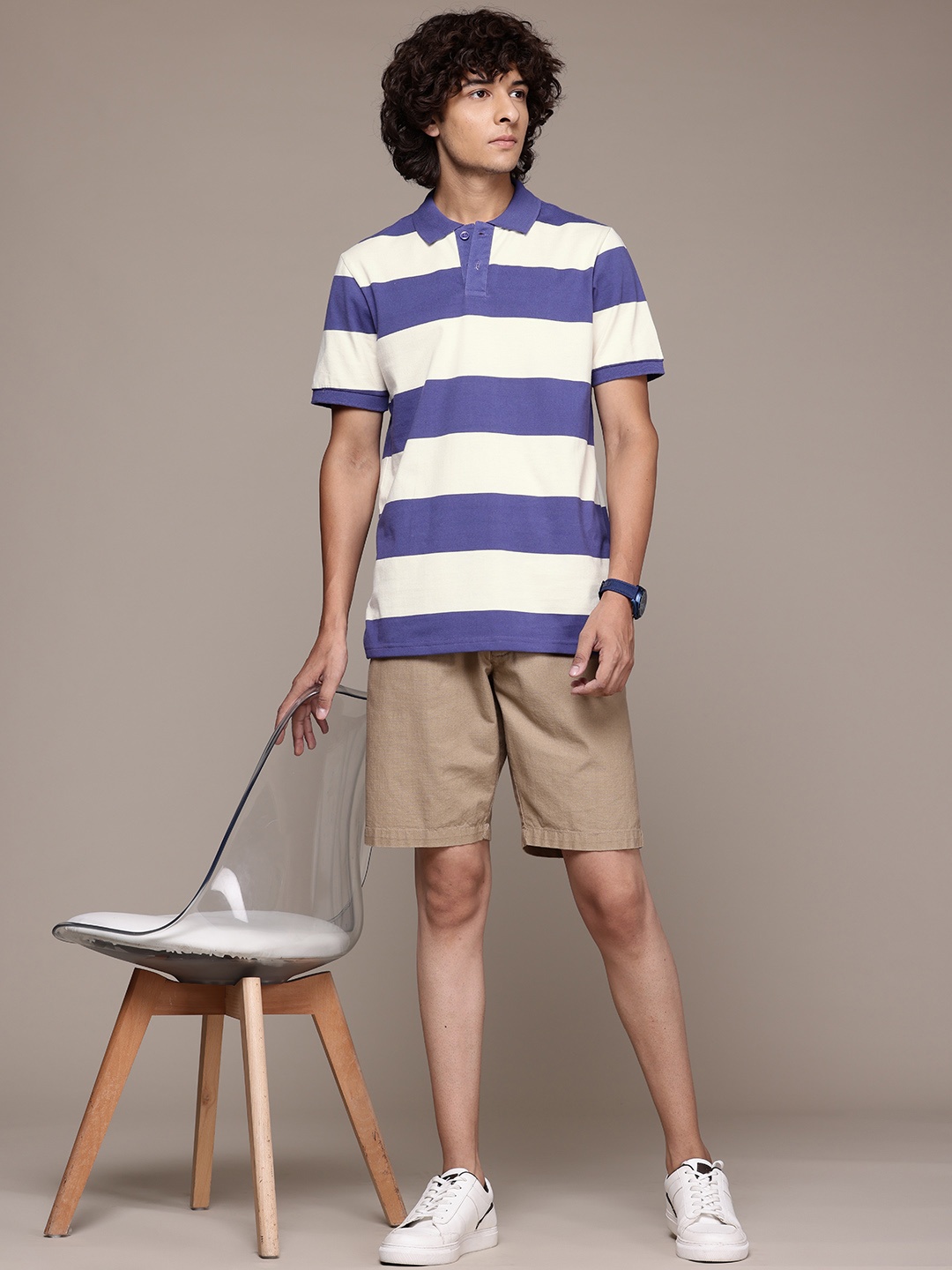 

The Roadster Lifestyle Co. Men Striped Polo Collar T-shirt, Blue