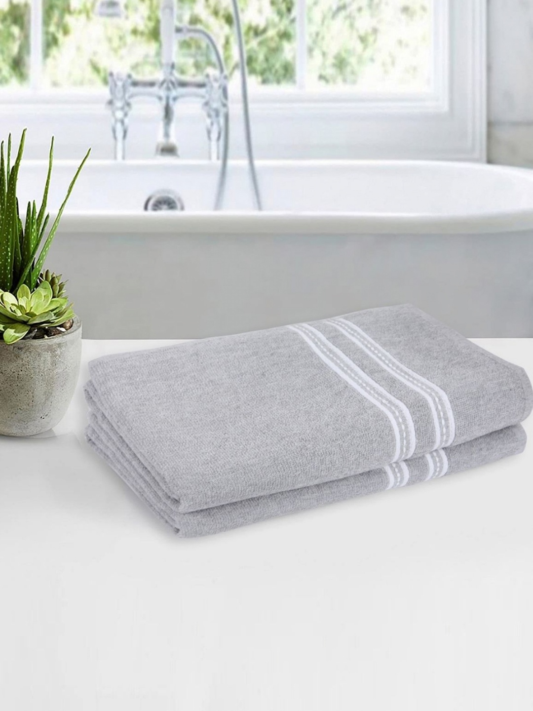 

Myntra Elegant Homes Silvertoned & White 2 Pieces Cotton 500 GSM Bath Towels, Silver