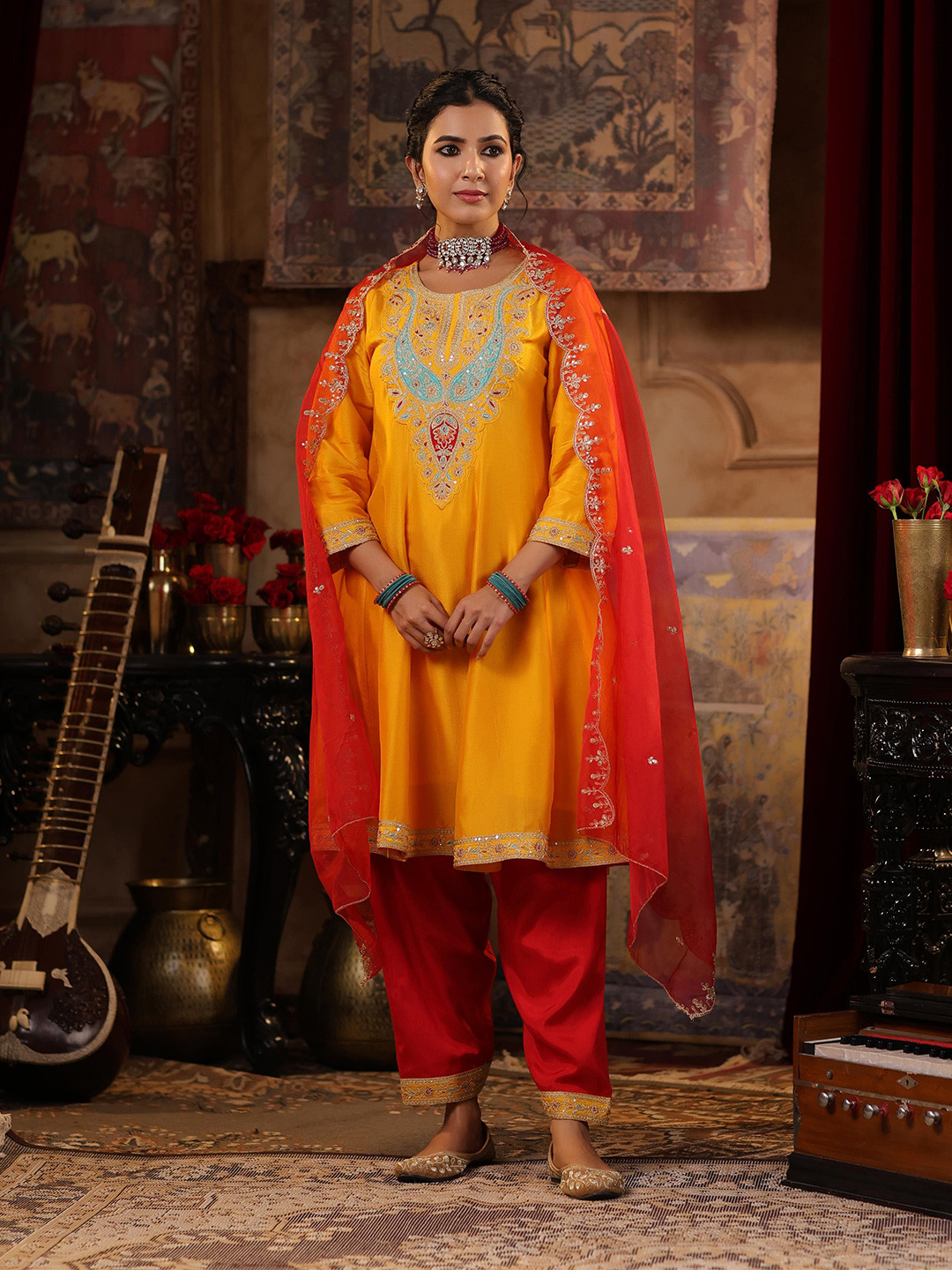 

SCAKHI Ethnic Motifs Embroidered Thread Work Dupion Silk Kurta With Salwar & Dupatta, Mustard