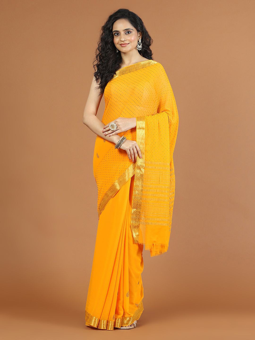 

Meena Bazaar Embellished Beads and Stones Poly Chiffon Saree, Yellow