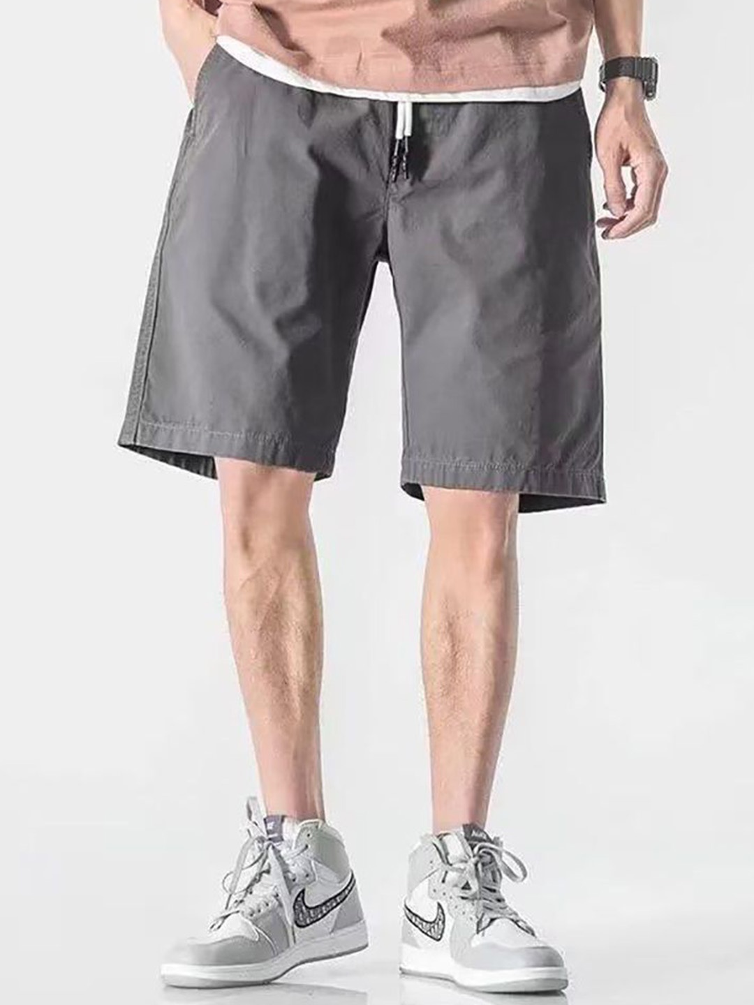 

StyleCast x Revolte Men Solid Regular Fit Mid-Rise Shorts, Grey
