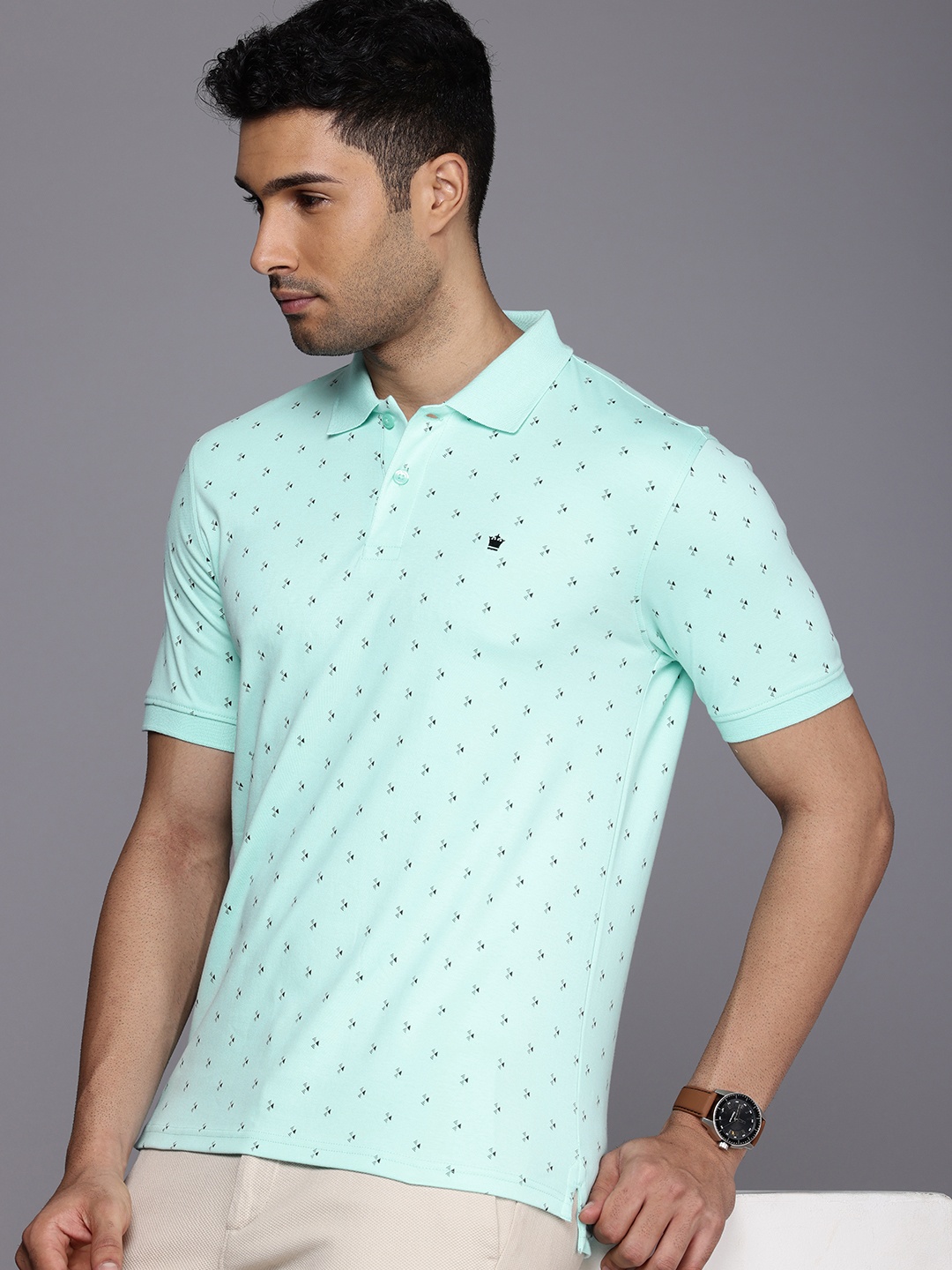 

Louis Philippe Pure Cotton Geometric Printed Polo Collar T-shirt, Turquoise blue
