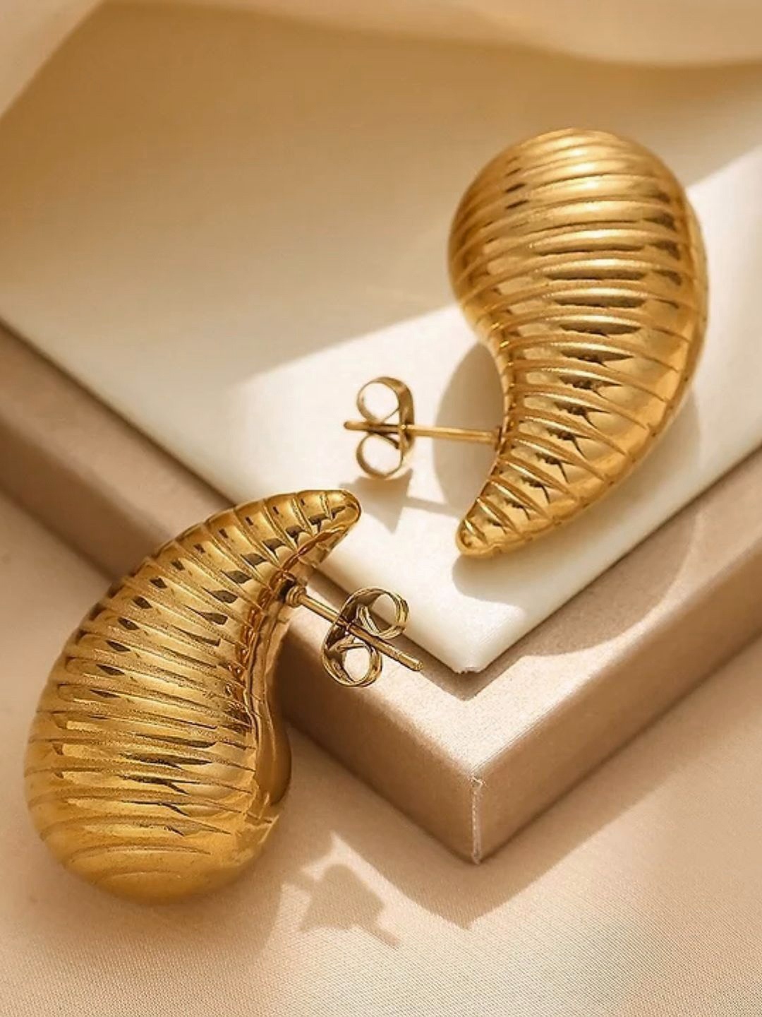 

DressBerry Gold Plated Stainless Steel Teardrop Shaped Studs