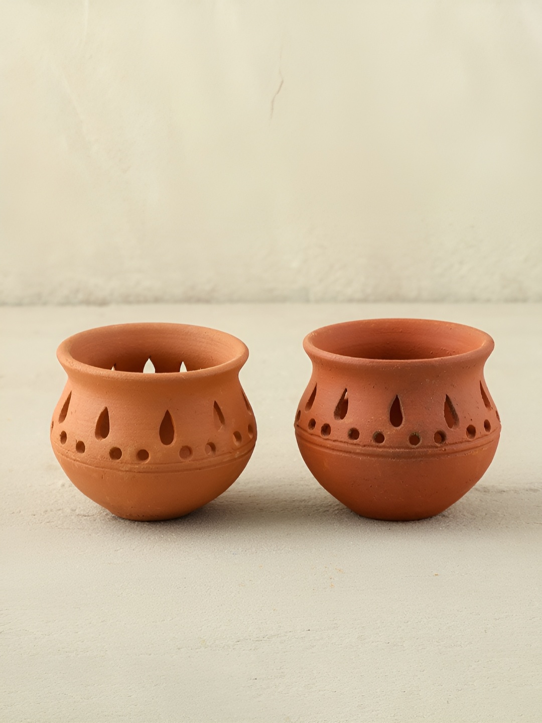 

Eyaas Brown 2 Pieces Carved Terracotta Matka Diyas