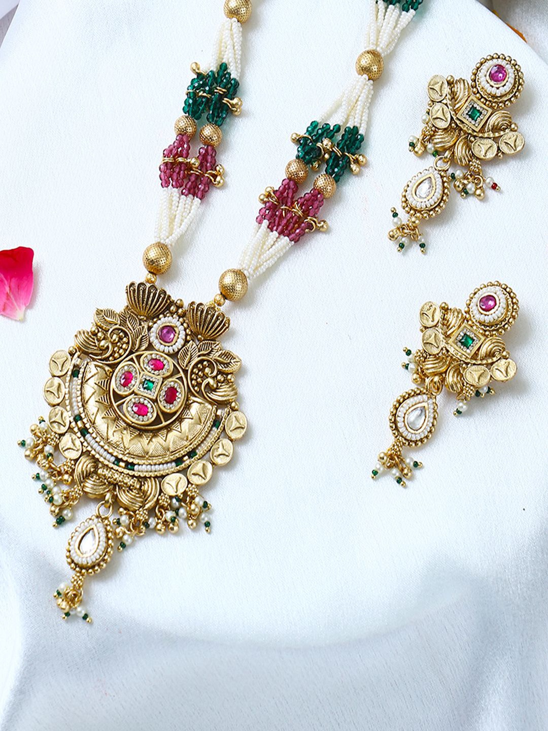 

Anouk Gold Plated Emerald Stones Studded & Beaded Jewellery Set