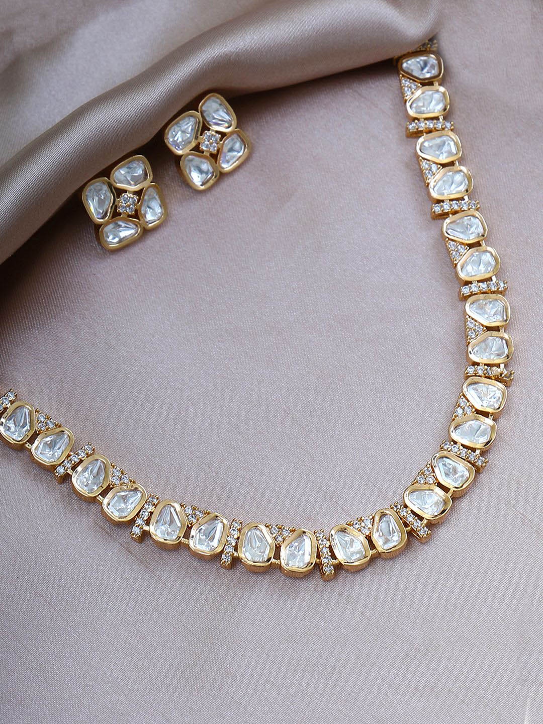 

Adwitiya Collection Gold Plated Kundan Stone Studded Jewellery Set