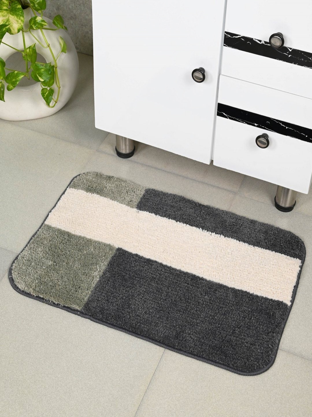 

Saral Home Grey & Green Textured 2000 GSM Anti- Skid Bath Rug