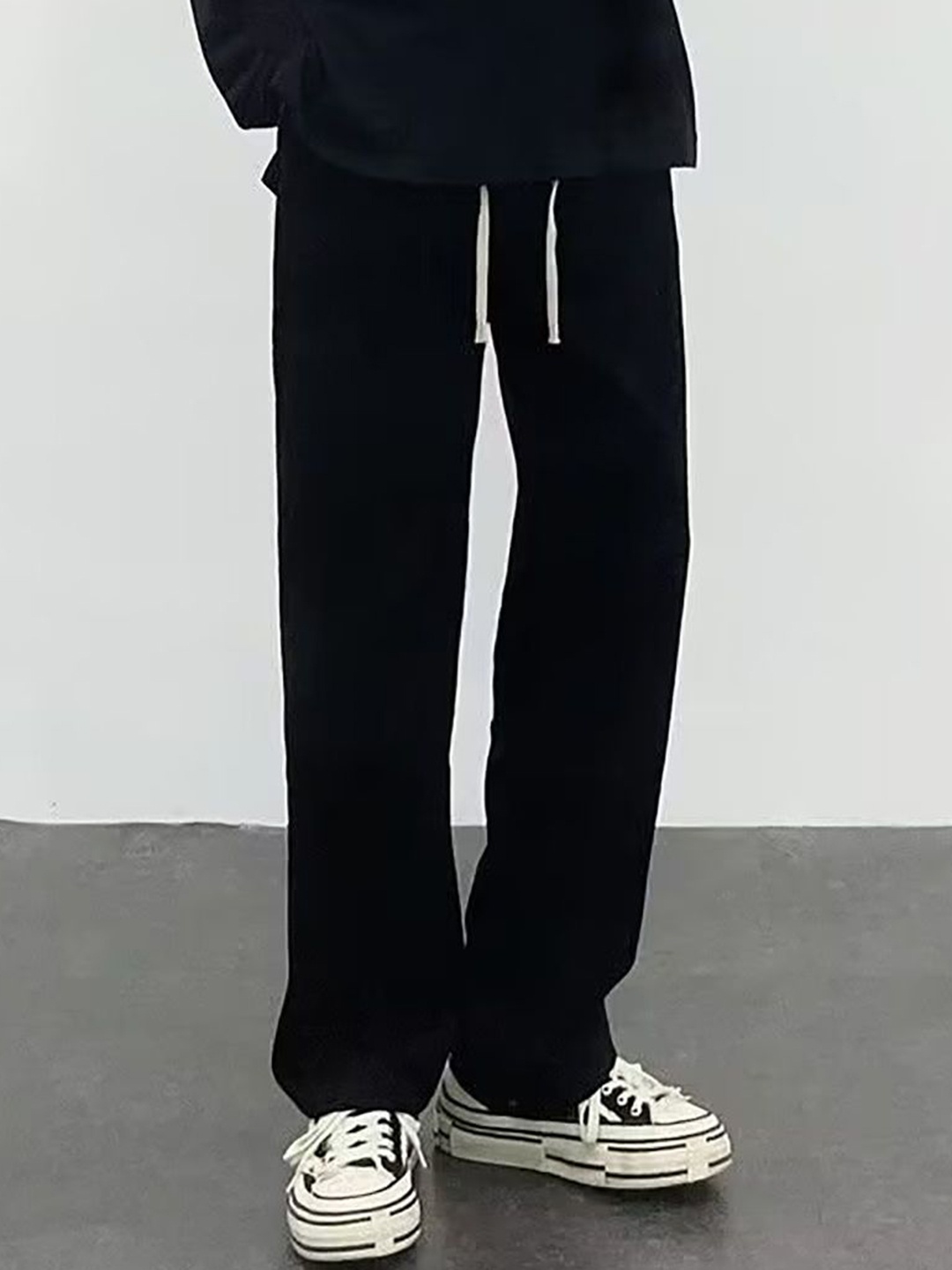 

StyleCast x Revolte Men Solid Mid-Rise Pleated Parallel Trousers, Black