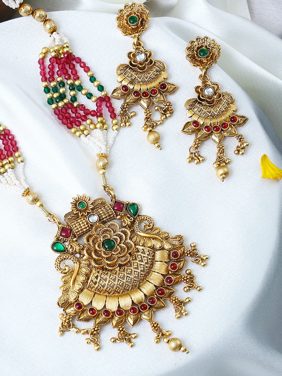 

Adwitiya Collection Gold-Plated Studded & Beaded Antique Floral Motifs Jewellery Set