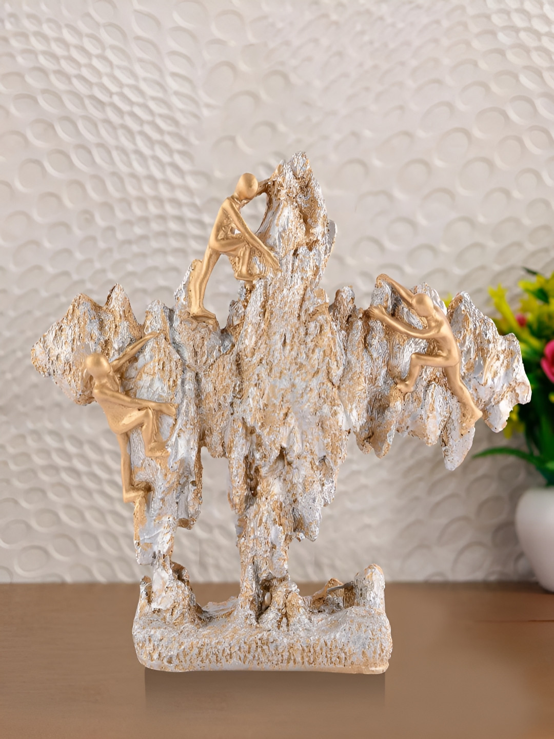 

Zart Gold-Toned & Silver Toned Three People Figurine Showpiece