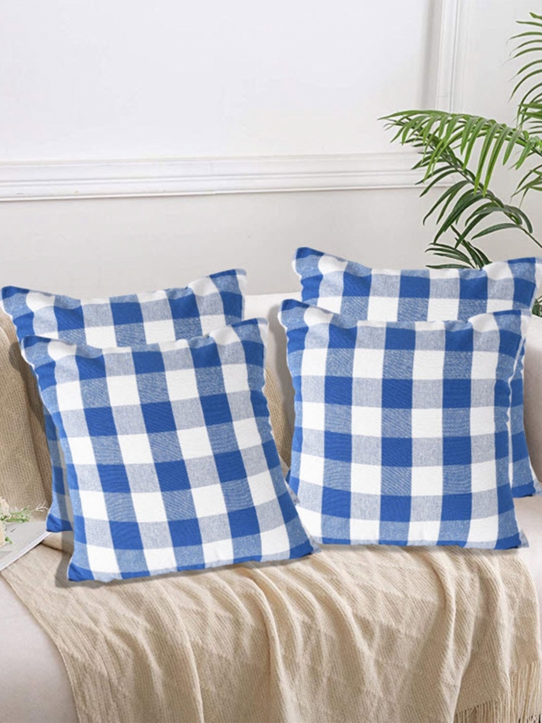 

Lushomes Blue & White 4 Pieces Checked Square Cushion Covers